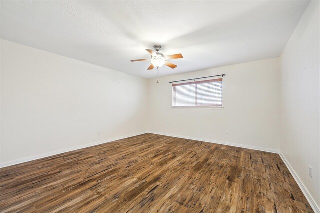 507 Williamsport St, League City, TX 77573 - unfurnished room featuring ceiling fan, dark wood-type flooring, and baseboards