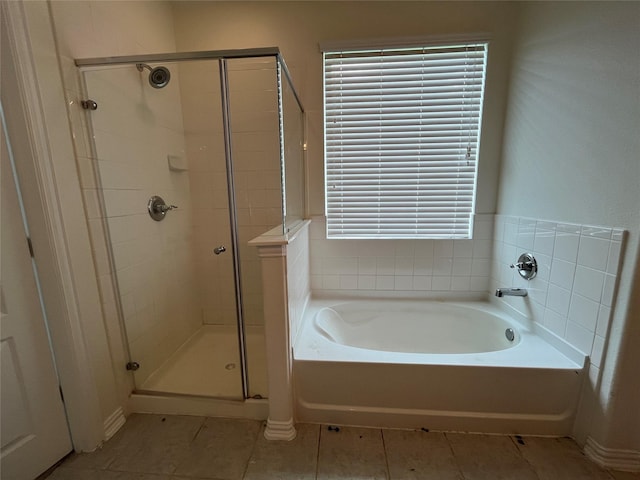 31909 Mckinley Run Dr, Hockley, TX 77447 - full bath featuring a bath, a stall shower, and tile patterned flooring