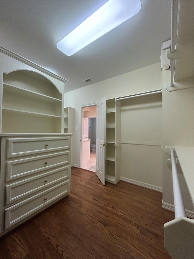 6021 Valley Forge Dr, Houston, TX 77057 - spacious closet featuring dark wood-type flooring