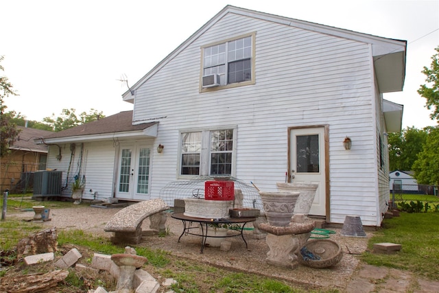 10406 Broadstairs St, Houston, TX 77013 - rear view of property with french doors, central air condition unit, and a patio area