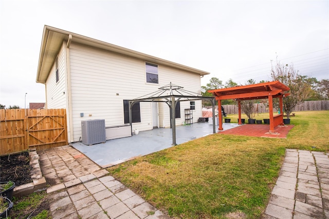 7707 Kempsey Ln, Houston, TX 77040 - rear view of property with cooling unit, a patio, a pergola, a gazebo, and a gate