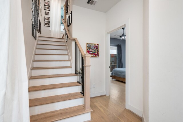 1747 Ojeman Spring Ln, Houston, TX 77055 - stairway with wood finished floors and baseboards