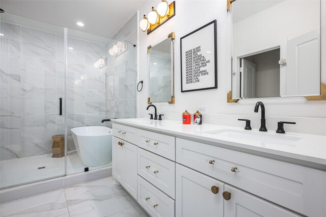 1747 Ojeman Spring Ln, Houston, TX 77055 - full bathroom featuring marble look tiles, double vanity, a stall shower, a soaking tub, and recessed lighting