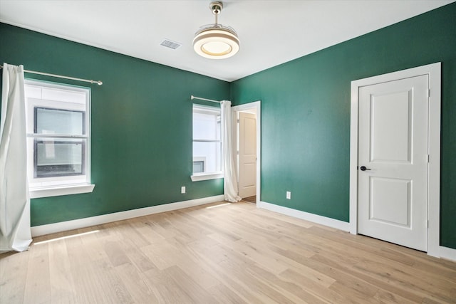 1747 Ojeman Spring Ln, Houston, TX 77055 - unfurnished bedroom with wood finished floors and baseboards