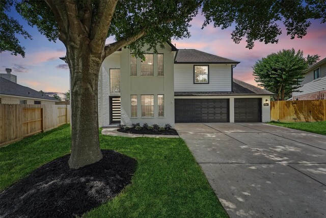16739 Innisbrook Dr, Houston, TX 77095 - view of front of house with driveway, a shingled roof, and an attached garage