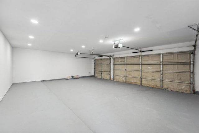 16739 Innisbrook Dr, Houston, TX 77095 - garage with recessed lighting and a garage door opener