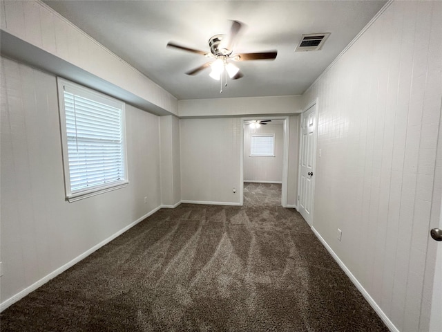 307 Veselka Road Cr, Freeport, TX 77541 - carpeted empty room with ceiling fan and baseboards