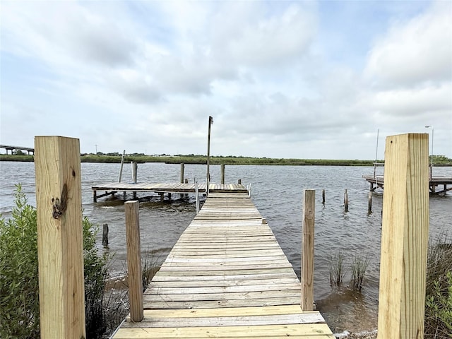 307 Veselka Road Cr, Freeport, TX 77541 - dock featuring a water view