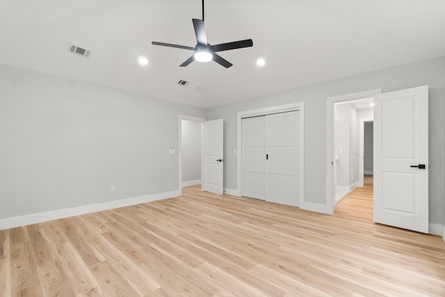 9 Indian Cedar Ln, The Woodlands, TX 77380 - unfurnished bedroom featuring baseboards, light wood finished floors, a closet, recessed lighting, and ceiling fan