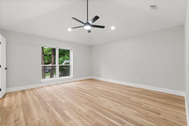 9 Indian Cedar Ln, The Woodlands, TX 77380 - unfurnished room with light wood-style flooring, lofted ceiling, baseboards, ceiling fan, and recessed lighting