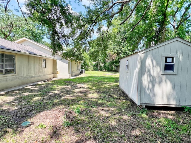 5813 Mayle St, Houston, TX 77016 - view of yard with an outbuilding