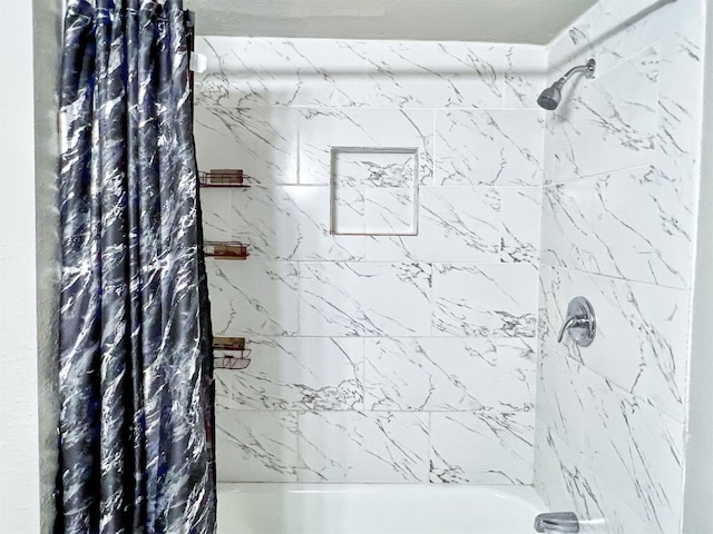 5813 Mayle St, Houston, TX 77016 - bathroom featuring shower / tub combo