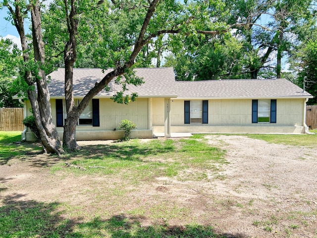 5813 Mayle St, Houston, TX 77016 - single story home with dirt driveway and a shingled roof