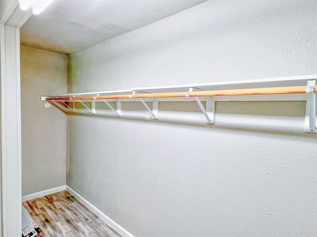 5813 Mayle St, Houston, TX 77016 - spacious closet with wood finished floors