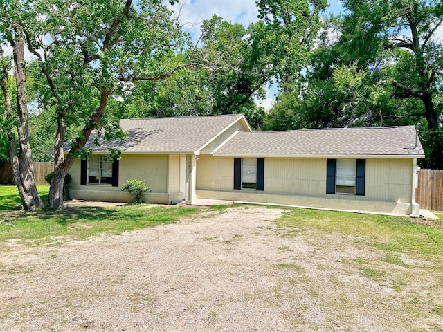 5813 Mayle St, Houston, TX 77016 - ranch-style house featuring dirt driveway and roof with shingles