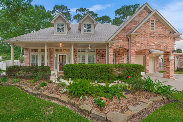 13719 Highland Cove Dr, Houston, TX 77070 - view of front of home featuring brick siding, roof with shingles, a garage, and driveway