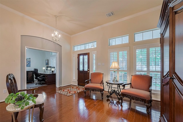 13719 Highland Cove Dr, Houston, TX 77070 - entryway with ornamental molding, hardwood / wood-style floors, baseboards, and a chandelier