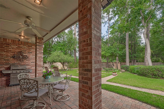 13719 Highland Cove Dr, Houston, TX 77070 - view of patio featuring ceiling fan, outdoor dining area, and area for grilling
