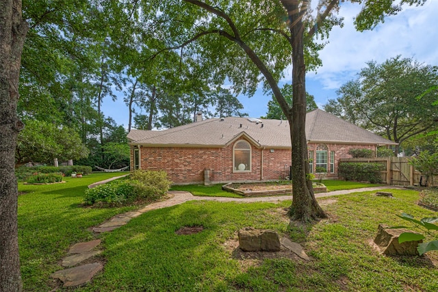 13719 Highland Cove Dr, Houston, TX 77070 - view of front facade featuring brick siding and roof with shingles