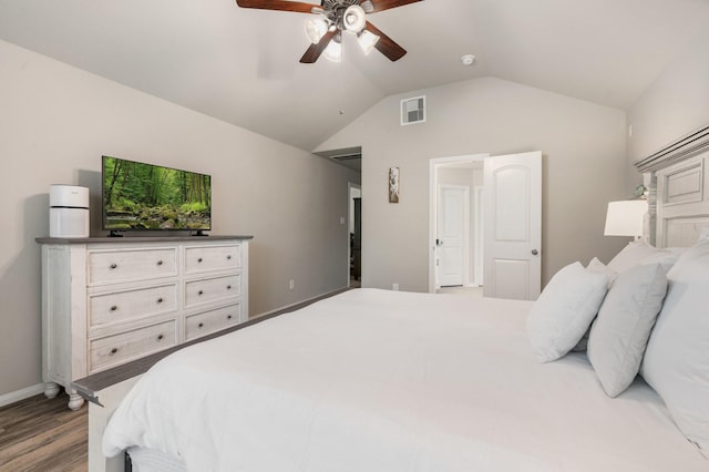 1724 Wandering Hills Rd, Conroe, TX 77304 - bedroom featuring wood finished floors, vaulted ceiling, baseboards, and ceiling fan