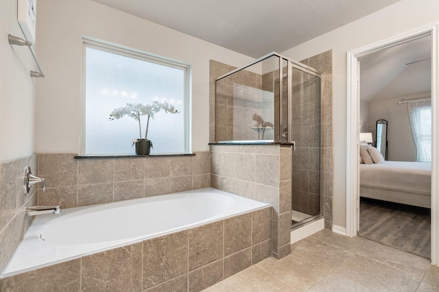1724 Wandering Hills Rd, Conroe, TX 77304 - ensuite bathroom with a stall shower and a bath