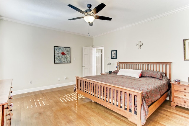 12203 Maple Rock Dr, Houston, TX 77077 - bedroom with light wood-style flooring, ornamental molding, baseboards, and a ceiling fan