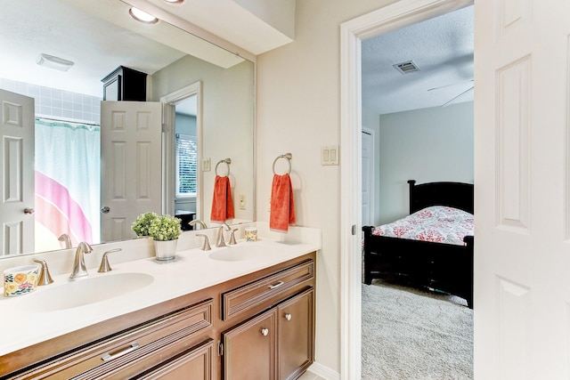 12203 Maple Rock Dr, Houston, TX 77077 - bathroom with ensuite bath, double vanity, and curtained shower