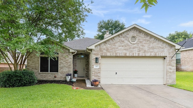 259 Adobe Ter S, Montgomery, TX 77316 - ranch-style house featuring concrete driveway, brick siding, a front yard, an attached garage, and a chimney