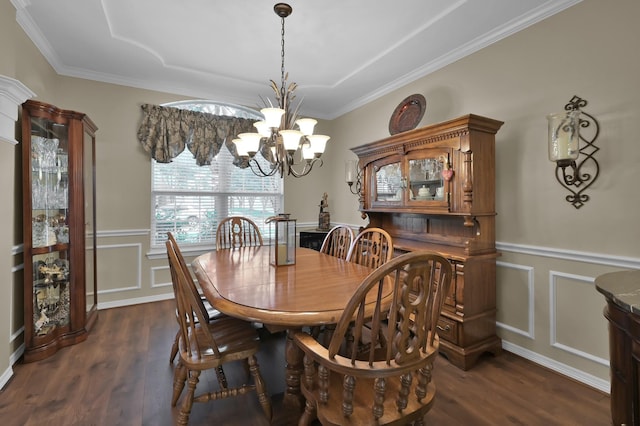 17419 Crescent Canyon Dr, Houston, TX 77095 - dining room with a chandelier, a decorative wall, dark wood finished floors, ornamental molding, and a wainscoted wall