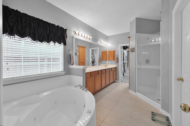17419 Crescent Canyon Dr, Houston, TX 77095 - bathroom featuring vanity, a tub with jets, a shower stall, and tile patterned flooring