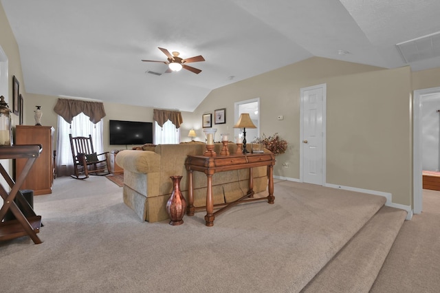 17419 Crescent Canyon Dr, Houston, TX 77095 - living area with vaulted ceiling, light colored carpet, ceiling fan, and baseboards