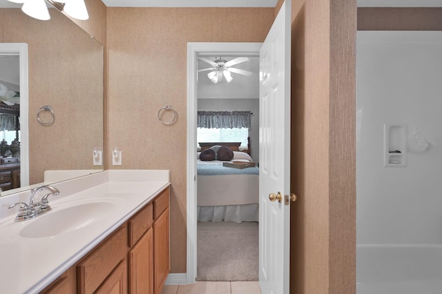 17419 Crescent Canyon Dr, Houston, TX 77095 - ensuite bathroom with vanity, a ceiling fan, and tile patterned flooring