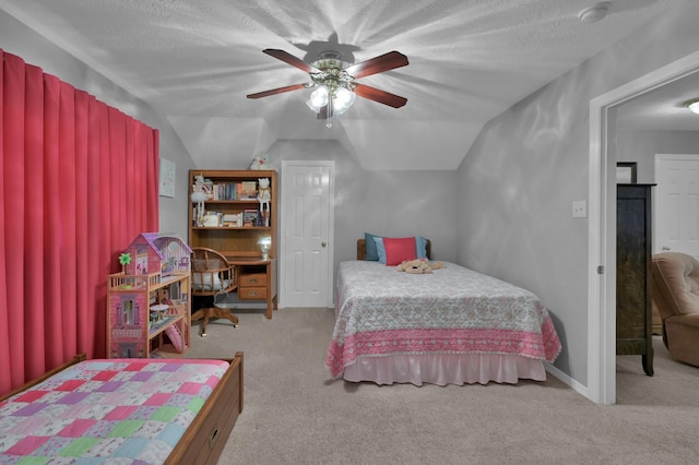 17419 Crescent Canyon Dr, Houston, TX 77095 - bedroom with carpet, vaulted ceiling, a textured ceiling, and a ceiling fan