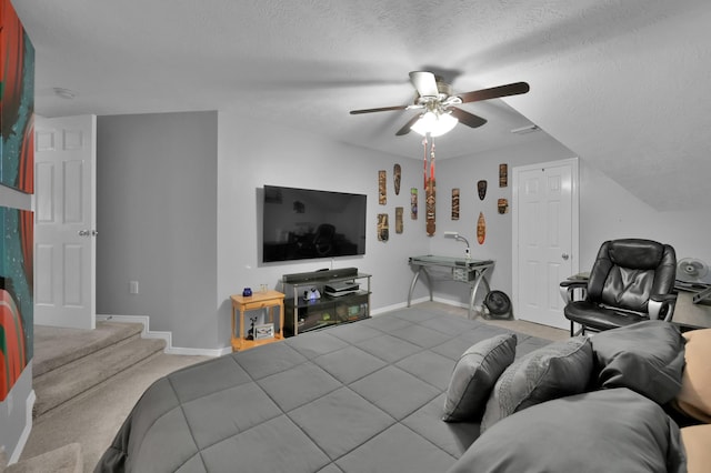 17419 Crescent Canyon Dr, Houston, TX 77095 - bedroom featuring baseboards, a ceiling fan, a textured ceiling, and carpet floors