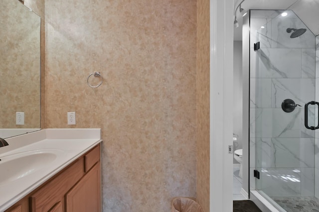 17419 Crescent Canyon Dr, Houston, TX 77095 - full bathroom featuring a stall shower, vanity, and toilet