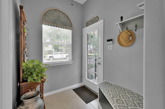 17419 Crescent Canyon Dr, Houston, TX 77095 - doorway to outside with tile patterned floors and baseboards
