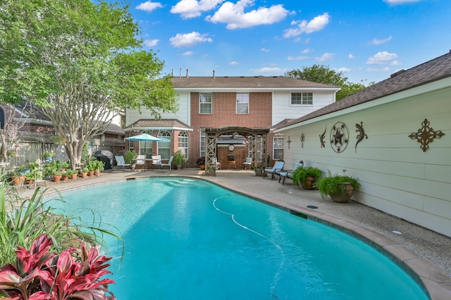17419 Crescent Canyon Dr, Houston, TX 77095 - view of pool with a patio area and grilling area