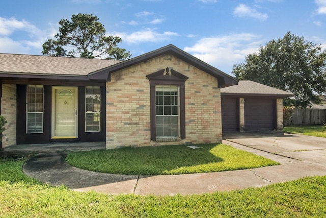 12503 Tall Forest Dr, Cypress, TX 77429 - single story home with a garage, concrete driveway, brick siding, and roof with shingles
