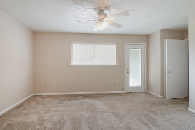 12503 Tall Forest Dr, Cypress, TX 77429 - carpeted spare room featuring ceiling fan and baseboards