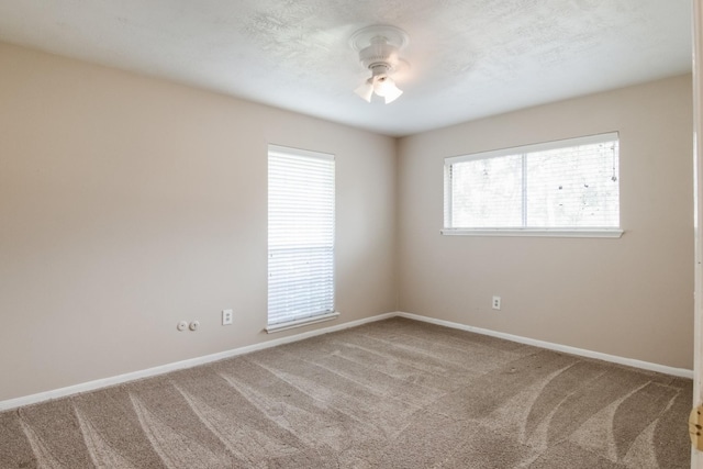 12503 Tall Forest Dr, Cypress, TX 77429 - carpeted spare room featuring ceiling fan and baseboards