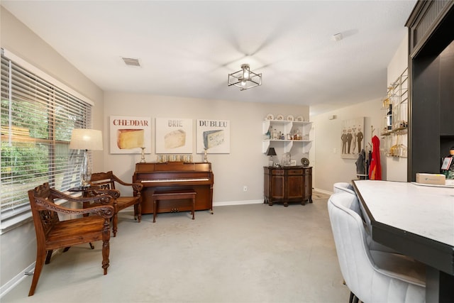 5227 Aberton Ln, Spring, TX 77379 - living area featuring baseboards and finished concrete floors