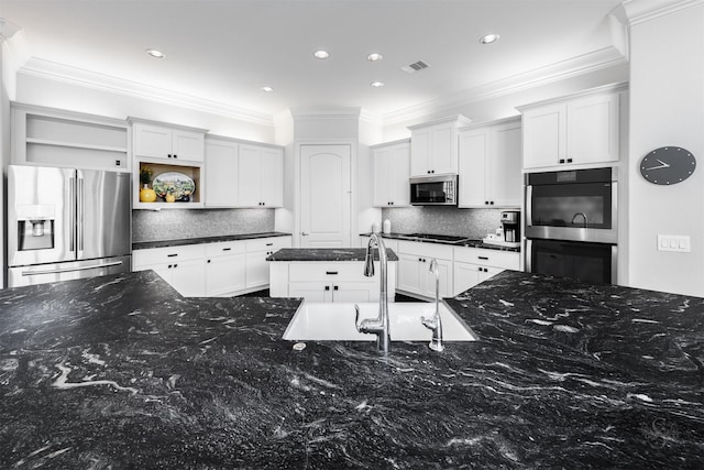 11 Floral Hills Ln, Fulshear, TX 77441 - kitchen featuring appliances with stainless steel finishes, open shelves, ornamental molding, tasteful backsplash, and dark stone counters