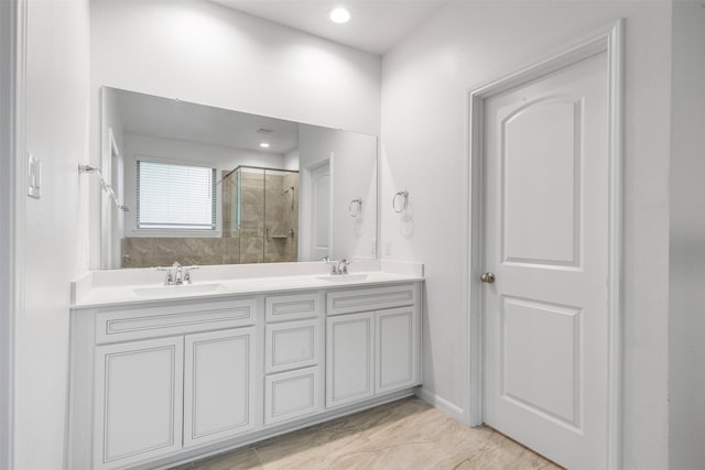 18202 Fehmarn Sound Cir, Houston, TX 77044 - full bathroom featuring a stall shower, double vanity, marble finish floors, and recessed lighting