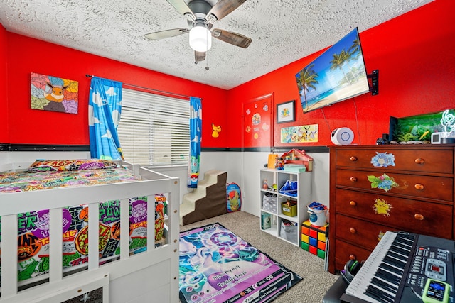 327 Brompton Ct, Highlands, TX 77562 - carpeted bedroom with a textured ceiling and a ceiling fan