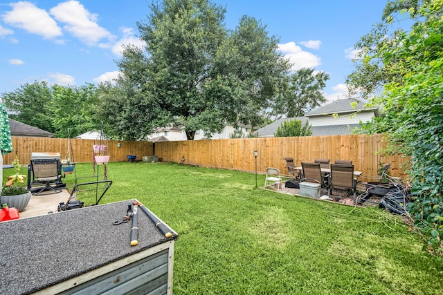 327 Brompton Ct, Highlands, TX 77562 - view of yard with a patio area
