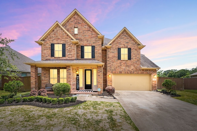 300 Bentside Pl, Clute, TX 77531 - traditional-style house with driveway, brick siding, an attached garage, and a porch