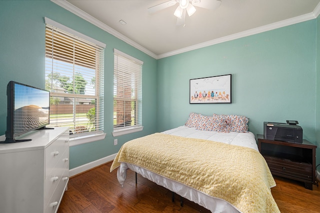 300 Bentside Pl, Clute, TX 77531 - bedroom with wood finished floors, crown molding, baseboards, and a ceiling fan