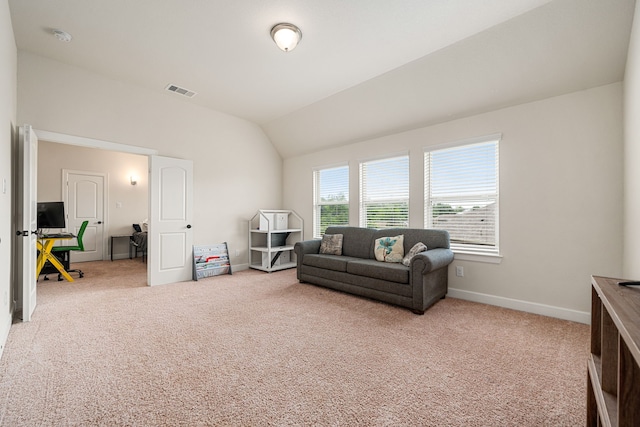 300 Bentside Pl, Clute, TX 77531 - carpeted living room featuring baseboards, lofted ceiling, and a desk