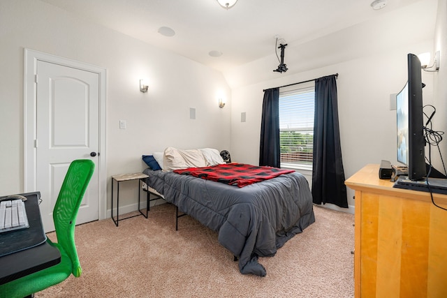 300 Bentside Pl, Clute, TX 77531 - bedroom featuring light colored carpet and vaulted ceiling