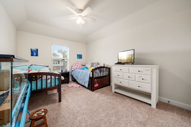 300 Bentside Pl, Clute, TX 77531 - bedroom with light carpet, ceiling fan, and vaulted ceiling
